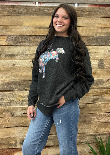 The CrissCross Chaos Bronc Leopard Sweatshirt