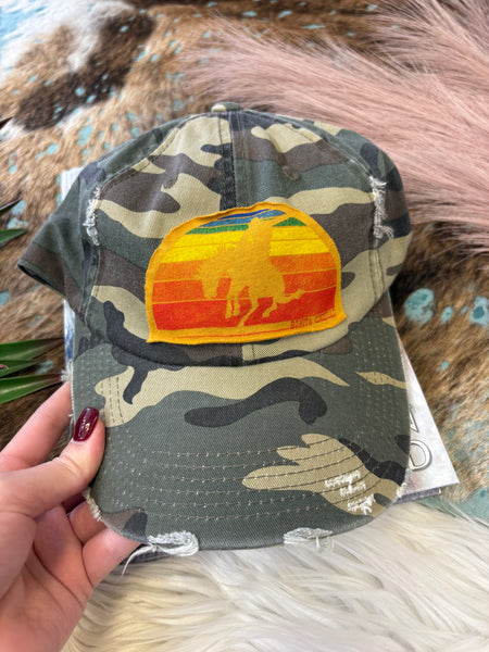 The Sunrise Bronc Distressed Camo Cap