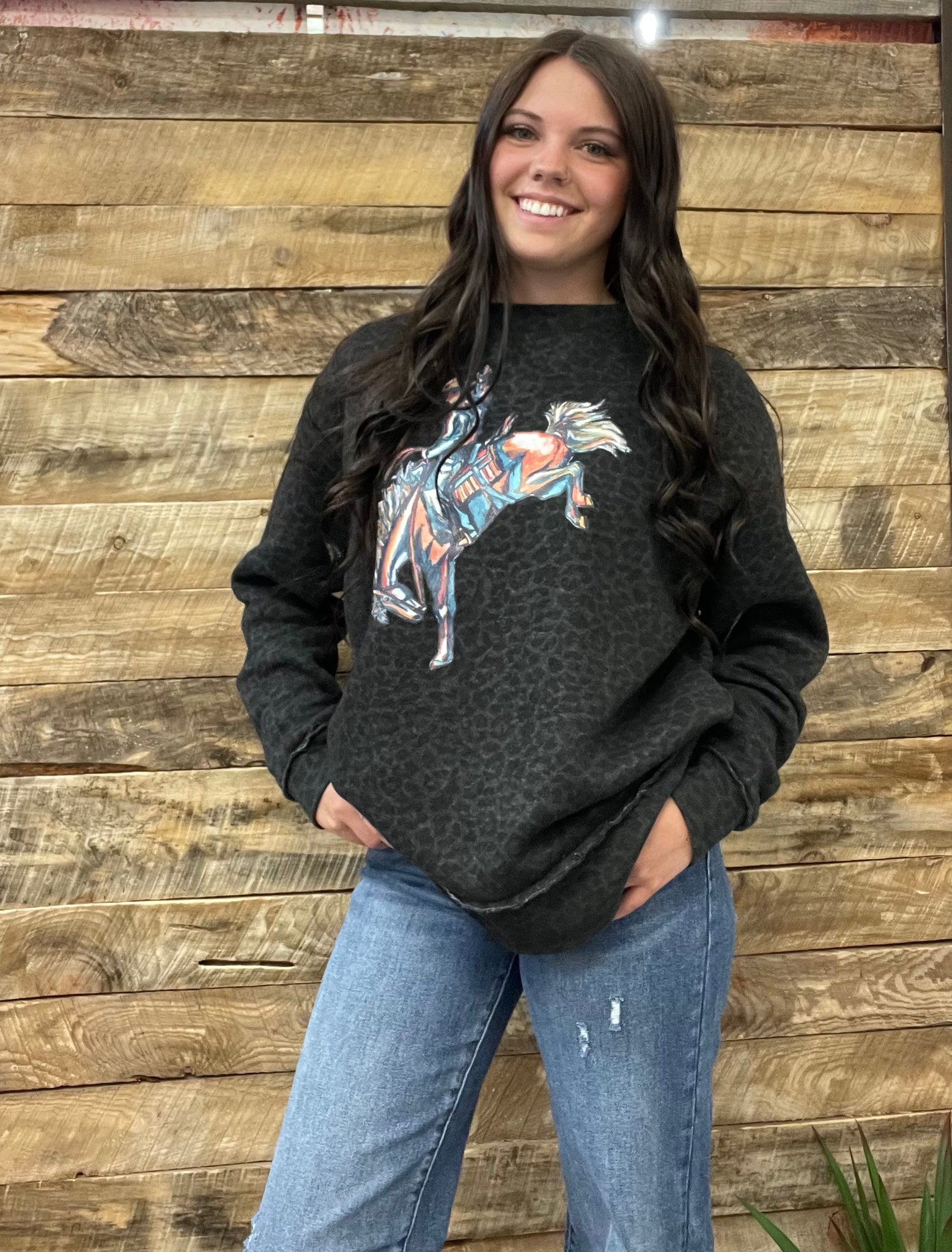 The CrissCross Chaos Bronc Leopard Sweatshirt
