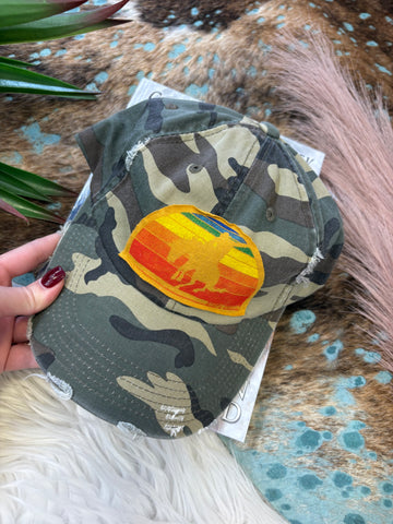 The Sunrise Bronc Distressed Camo Cap