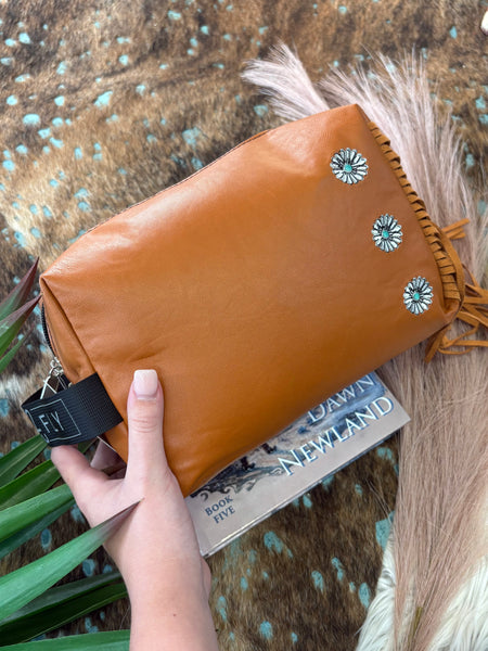 The Saddle Concho Traveler Pouch Bag