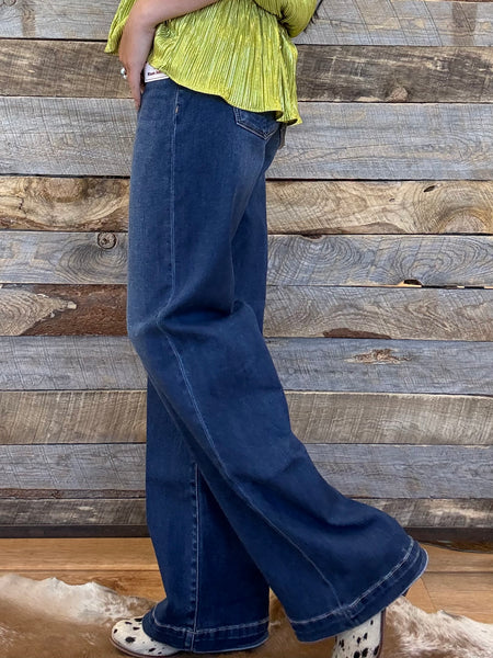 The Cloe Mid Rise Wide Leg Iron Press Dark Jean