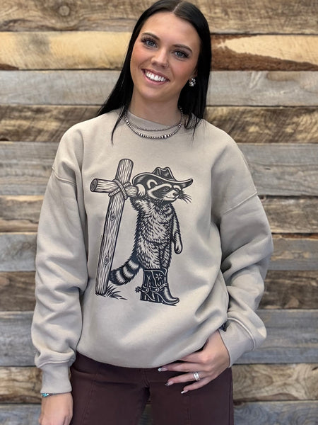 The Cowboy Raccoon Cross Mocha Sweatshirt