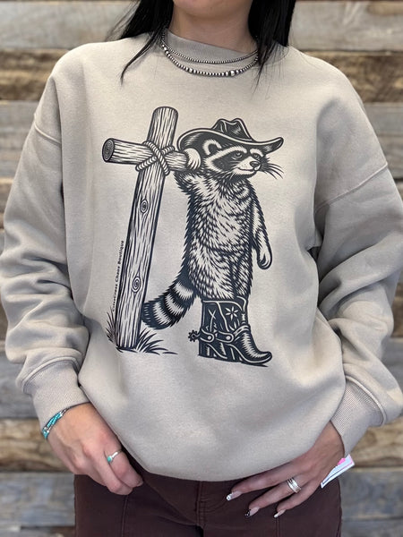 The Cowboy Raccoon Cross Mocha Sweatshirt