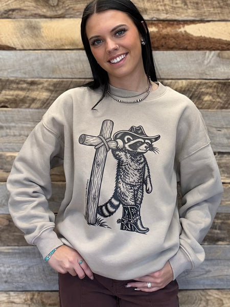 The Cowboy Raccoon Cross Mocha Sweatshirt