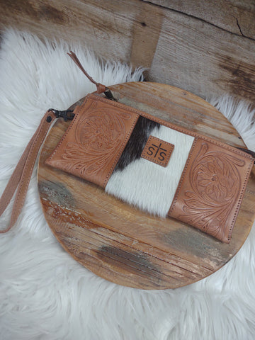 The Cowhide and Leather Clutch