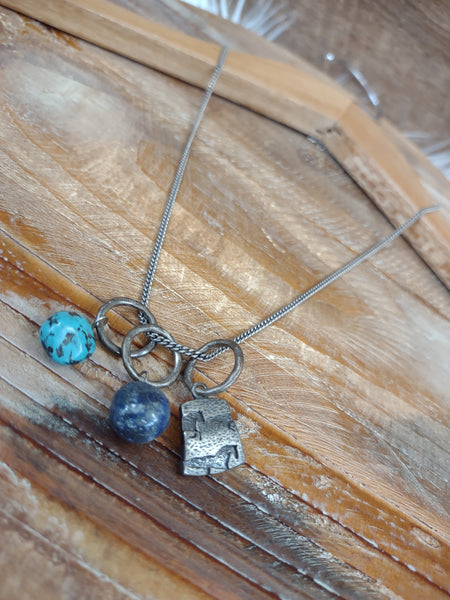 The Triple Charm Necklace