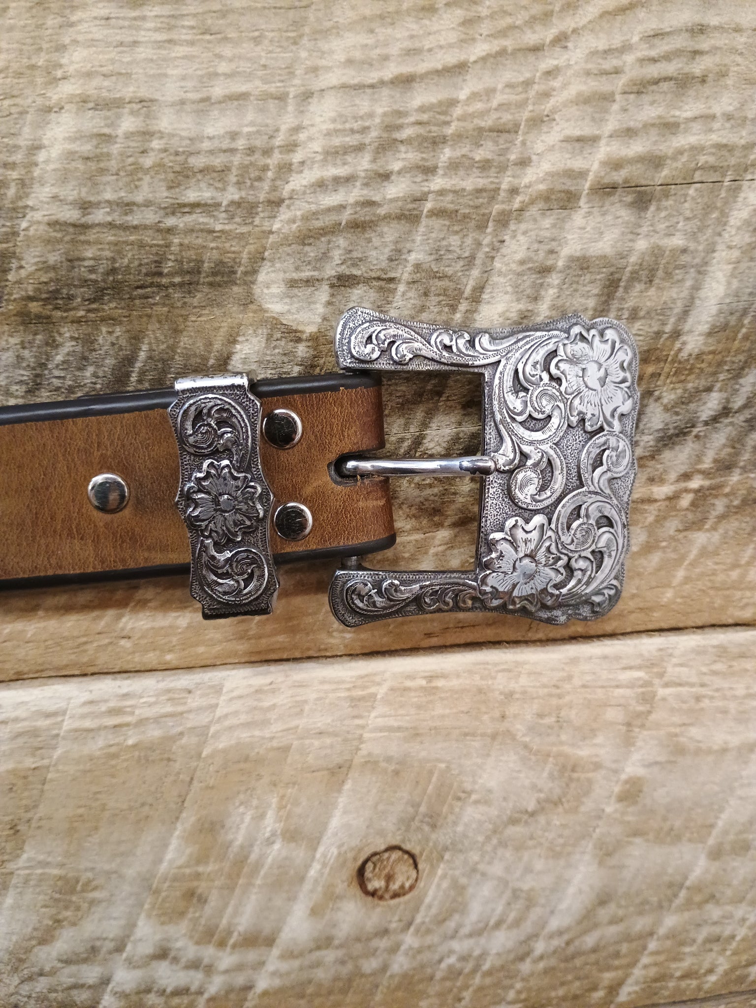 The Brown Belt With Silver Buckle