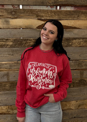 The Dreaming of a Wyoming Christmas Heathered Red Sweatshirt