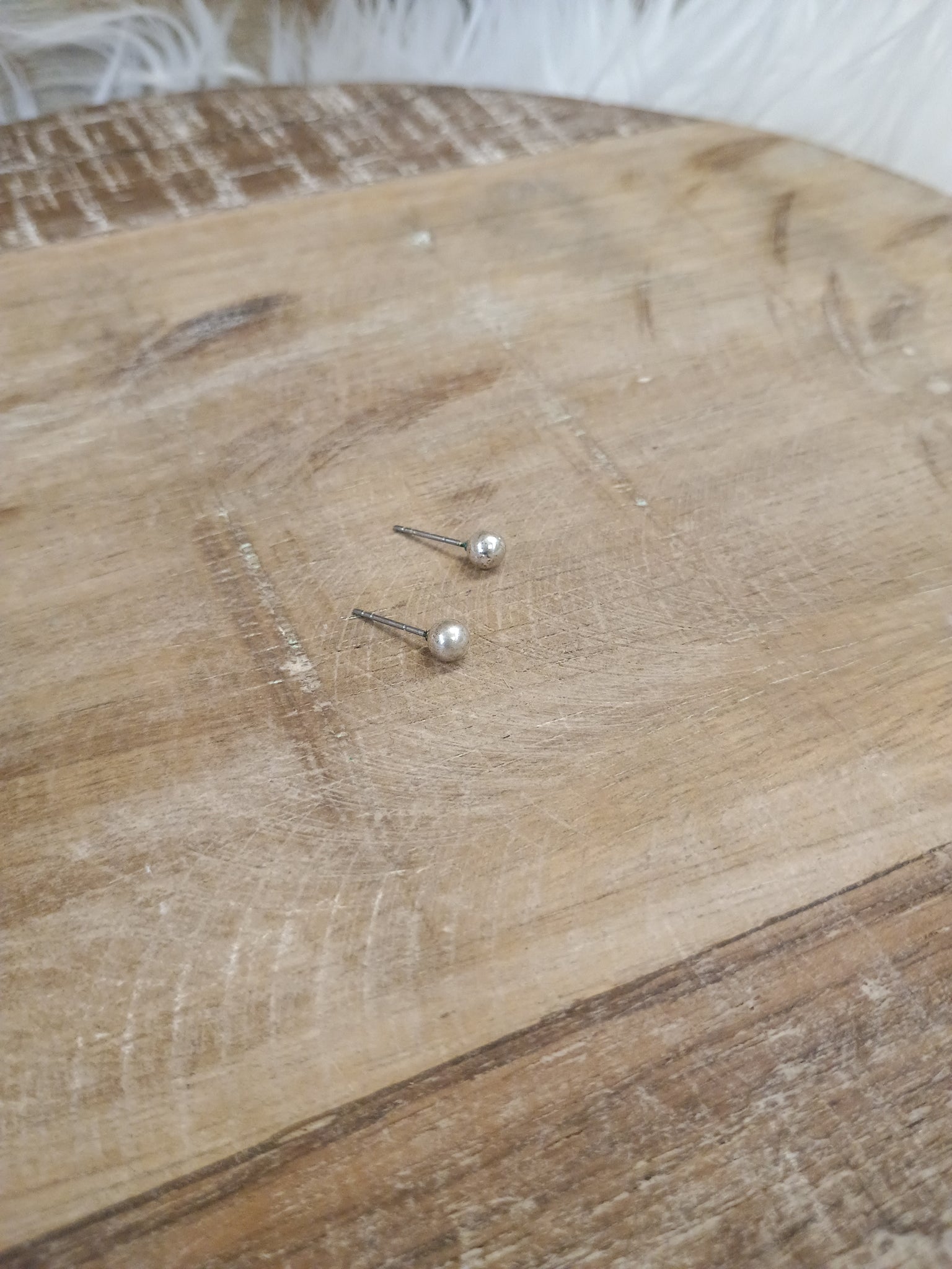 The Tiny Silver Stud Earrings