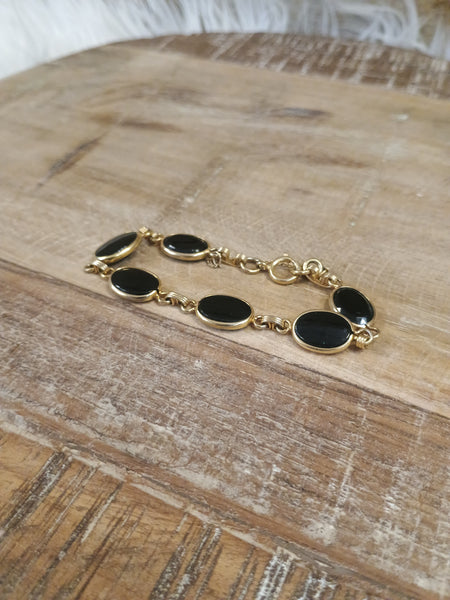 The Black and Gold Bracelet