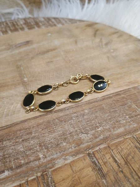 The Black and Gold Bracelet